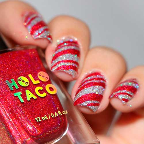 Cute short glittery red and silver candy cane nails 2020 design for Christmas celebration