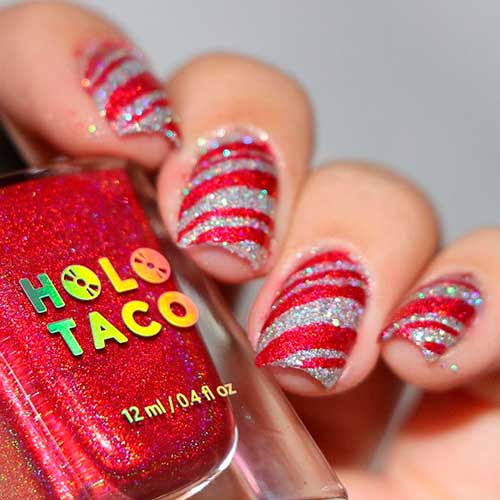 Cute short glittery red and silver candy cane nails 2020 design for Christmas celebration Cute short glittery red and silver candy cane nails 2020 design for Christmas celebration