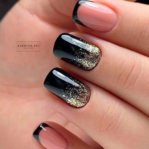 Glossy short black nails 2020 with gold glitter and two accent French tip nails design!