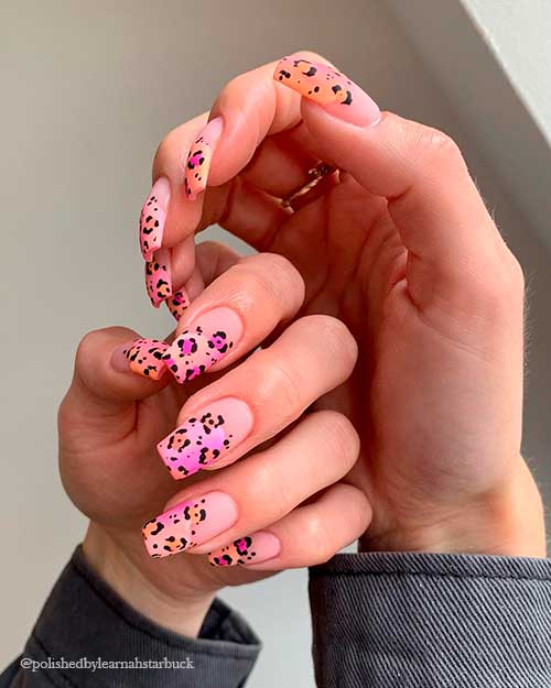 Dainty Pink and Peach Leopard Nails Gorgeous matte nude coffin nails 2021 with mixed pink and peach leopard print nail art on tips for summer days