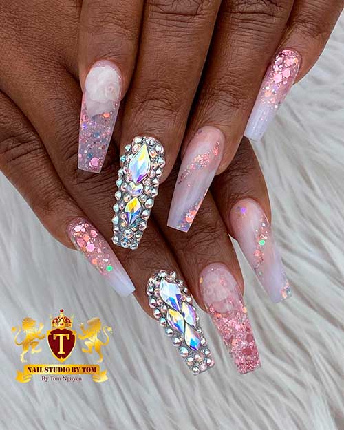 Gorgeous glittery nail art design that accentuated with bling nail which, boost the entire look!