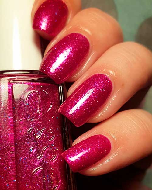 Vivid hot pink Head over Wheels nail polish from Essie Fall 2020 Roll with It Collection
