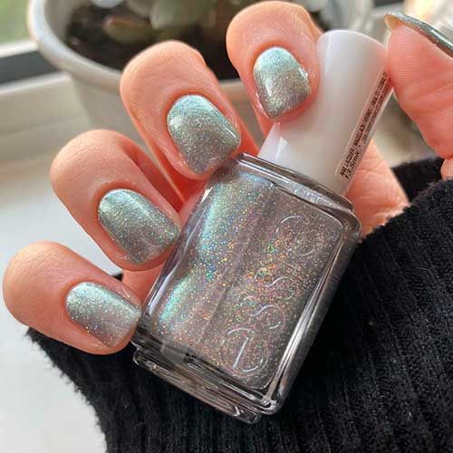 Wear cool silver autumn nails with let’s Boogie nail polish from Essie Fall 2020 Roll with It Collection