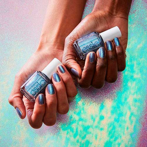 flippin’ good blue nail lacquer along with a green disco pearl effect from Essie Fall 2020 Roll with It Collection