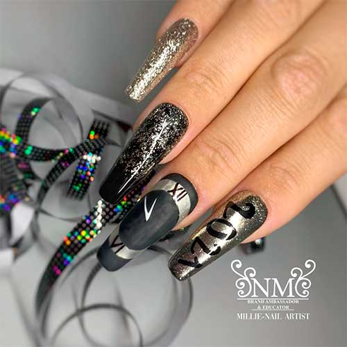 Black and gold new year nails coffin shaped design