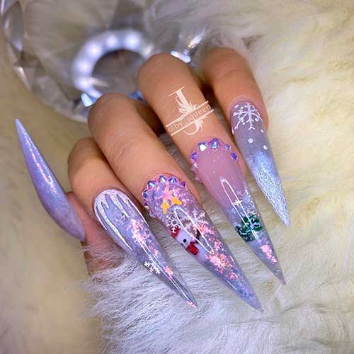 Cute Icy purple stiletto Christmas nails 2020 with glitter and rhinestones and accent snowman nails design!