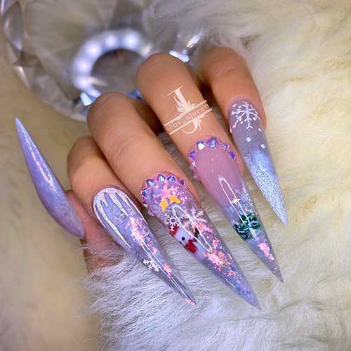 Cute Icy purple stiletto Christmas nails 2020 with glitter and rhinestones and accent snowman nails design! Cute Icy purple stiletto Christmas nails 2020 with glitter and rhinestones and accent snowman nails design!