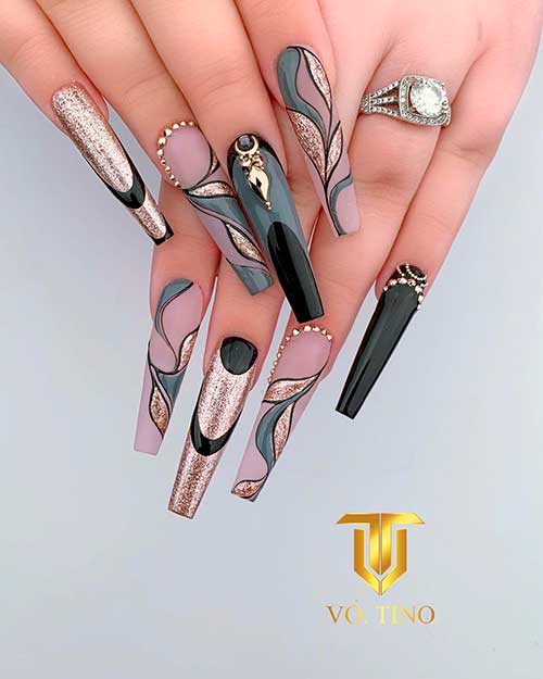 Cute black nails blended with gray color and rose gold glitter with some gold rhinestones! Cute black nails blended with gray color and rose gold glitter with some gold rhinestones!