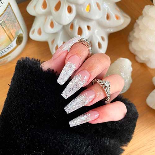 Cute silver glitter coffin shaped New Year Nails 2021 with nude color above the cuticles design! 
