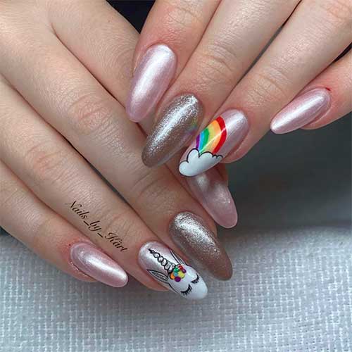 Cute unicorn nails with colorful unicorn horn nail design!