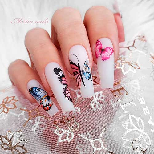 Cute coffin shaped spring butterfly nails 2021 over white base color, don’t hesitate to choose this cute spring nails idea!