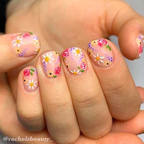 Cute short nails with floral nail art between white, red, and yellow spring florals for spring 2021! Cute short nails with floral nail art between white, red, and yellow spring florals for spring 2021!