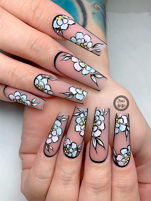 Transparent Black Nails with Pastel Flowers Long coffin transparent black spring nails 2023 with pastel-colored flowers and a bold black perimeter