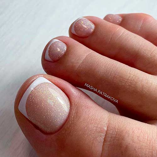 Gold Shimmery French pedicure design on of the best French Pedicure Ideas 2021