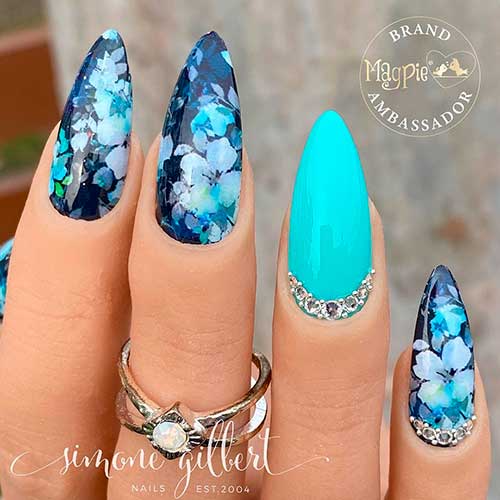 Stunning Floral Nail Art Design Stunning Floral Nail Art Design with rhinestones and accent turquoise nail for spring time