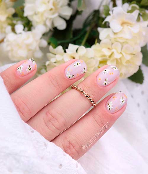 Stylish spring short nails 2021 with white floral nail art! Stylish spring short nails 2021 with white floral nail art!
