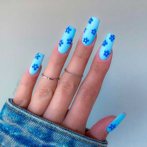 Cute coffin shaped light blue nails 2021 with dark blue flowers