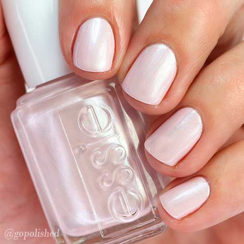 Cute short baby pink nails achieved with new Essie light pink nail polish Pillow Talk the Talk!