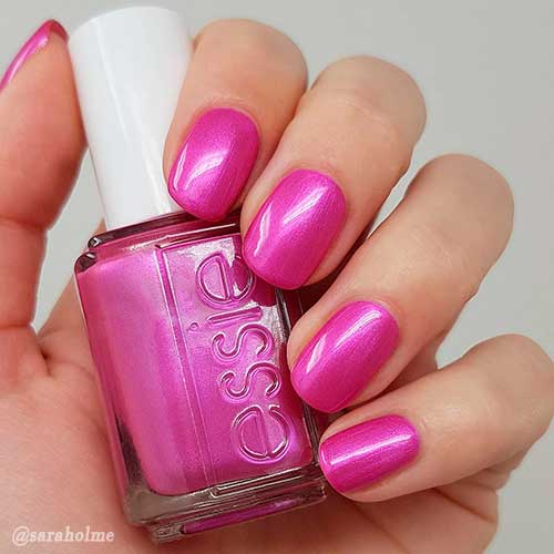 Cute short magenta nails achieved with Essie magenta nail polish Sleepover Squad!