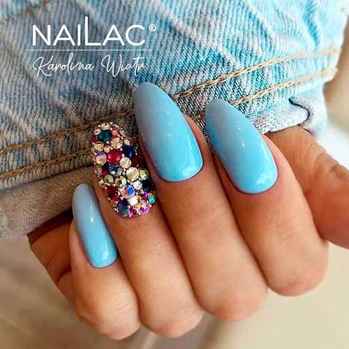 Glossy Light Blue Nail Art with accent bling nails for summer 2021