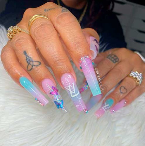 Long Ombre Pink and Blue Nails shimmer pink and blue ombre nails with rhinestones, and butterflies you will definitely love to wear