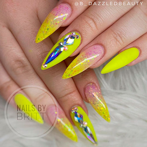 Cute neon yellow nails 2021 with glitter and blings!