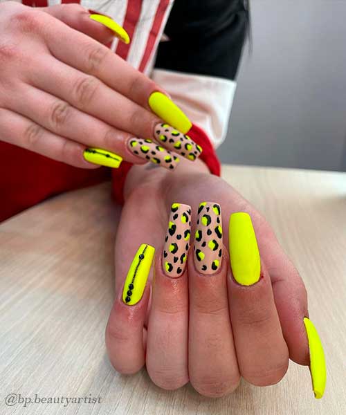 Long neon yellow nails 2021 with animal print nail art on two accent nails for the summertime!