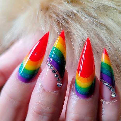 Gorgeous stiletto rainbow nails 2021 with rhinestones for summer days!