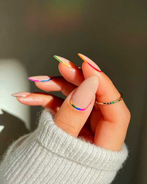Rainbow Ring Nail Art with nude base color for summer 2021