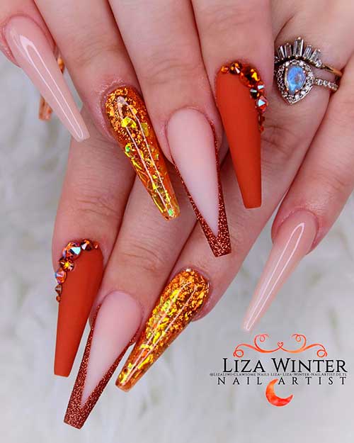 Combination of long coffin burnt Orange nails and Gold Tones which are the best fall nail ideas 2021
