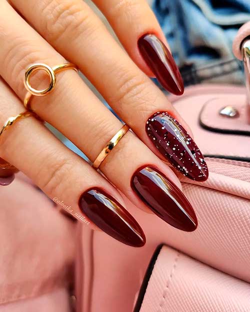 Glam Fall Nail Ideas: Red Wine Nails Glam Fall Nail Ideas 2021: Red Wine Nails with Accent Decorative white and black patches