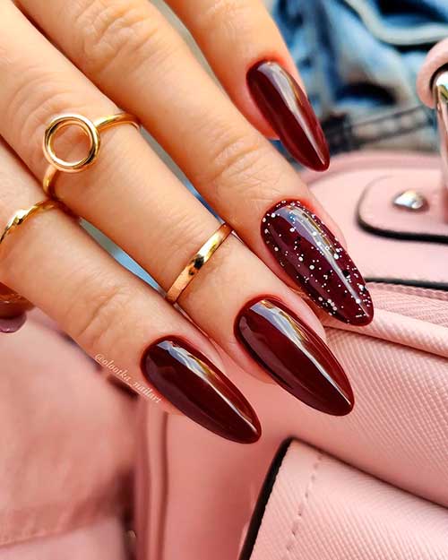 Glam Fall Nail Ideas 2021: Red Wine Nails with Accent Decorative white and black patches