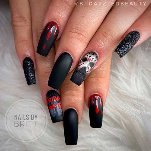 Scary Movie Nail Design Long square matte black coffin nails with blood drops, skull, and glitter nails for Halloween 2021