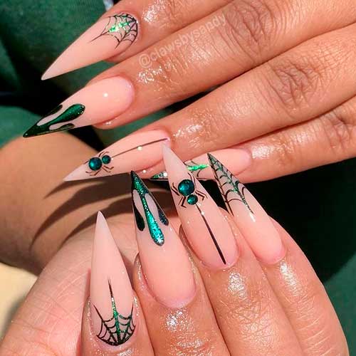 Spooky Stiletto Nude Halloween Nails 2021 with Spider Web and Black Drops on Accent Tip