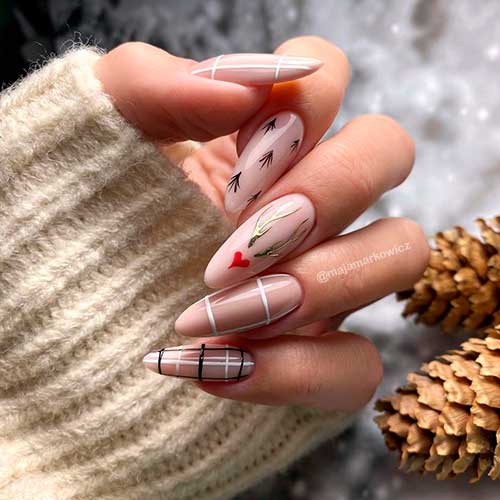 Classy Nude Almond Plaid Winter Nails with Accent Reindeer Horns and Red Heart Shape
