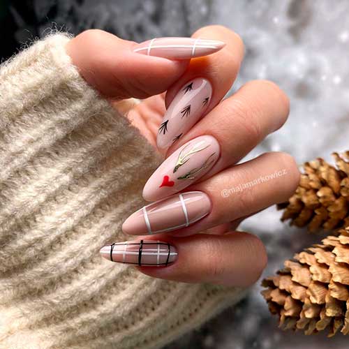Classy Nude Color Plaid Winter Nail Idea Classy Nude Almond Plaid Winter Nails with Accent Reindeer Horns and Red Heart Shape