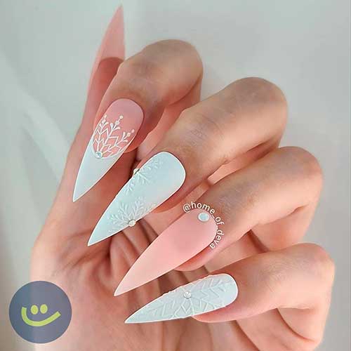 Classy Stiletto White and Nude Winter Nails 2021 with Snowflakes and a Single Rhinestone on Accent Nail