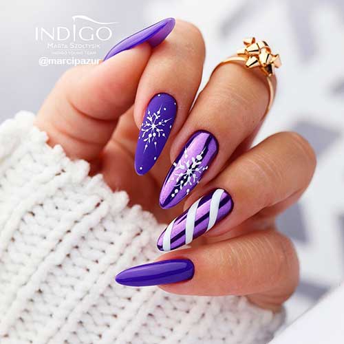 Glossy, Matte, and Chrome Purple Christmas Nails with White Snowflakes and Candy cane Strikes