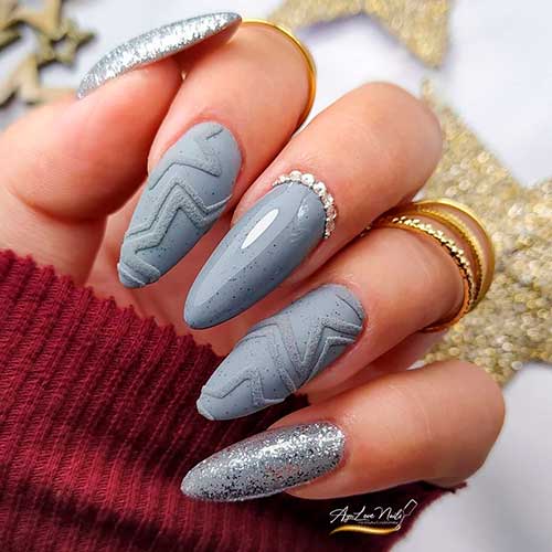 Gorgeous Almond Gray Nails with Black Flecks, Rhinestones, and Two Accent Silver Glitter Nails