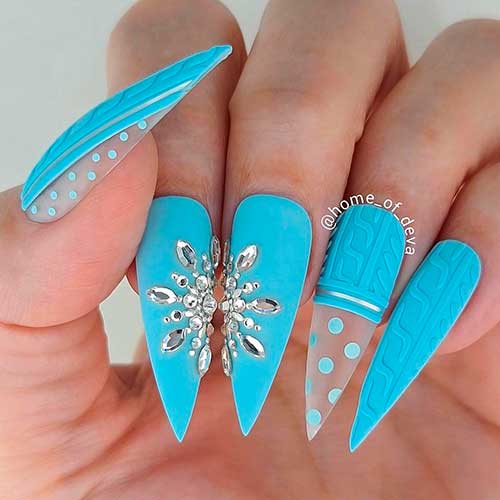 Gorgeous Stiletto Matte Light Blue Christmas Nails 2021 with Big Snowflake from Rhinestones, and Polka Dots