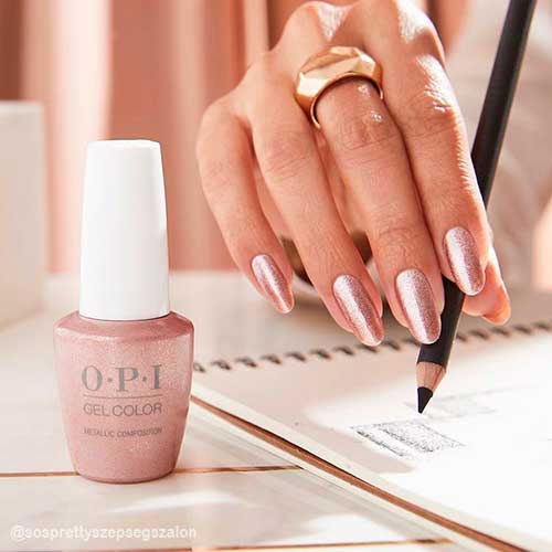 shimmery rose gold nails with OPI Metallic Composition for Fall 2021