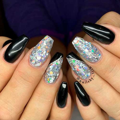 Medium coffin black and silver nails are perfect as winter nails