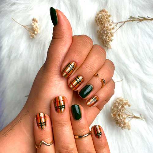 Short green and gold plaid nails that considered a perfect winter nails 2021 Idea
