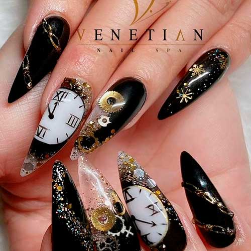 Stiletto Black and Gold Glamour New Year Nails with Glitter and Rhinestones
