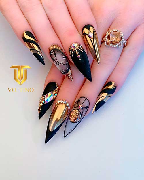 Stiletto Classy Matte Black New Years Eve Nails with Gold and Rhinestones