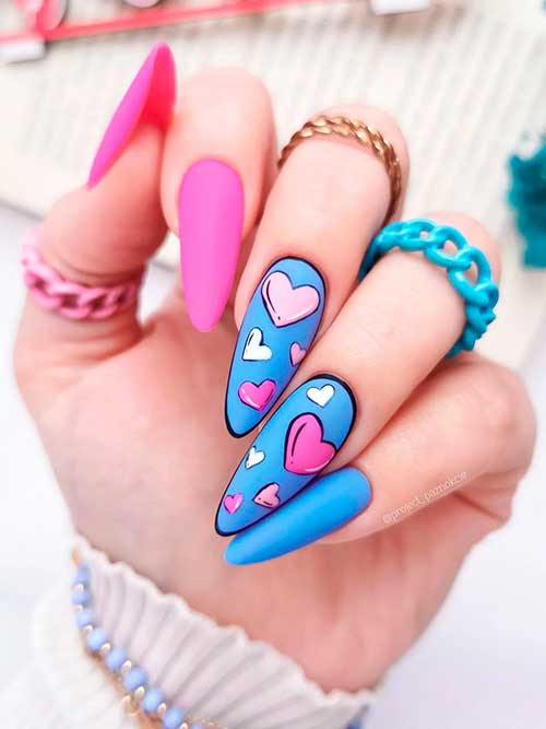 Long almond-shaped pastel matte pink and blue valentine’s pop art nails to celebrate Valentine’s Day