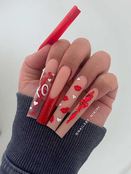 long square-shaped red and nude valentines nails 2023 with kiss lip nail art, rhinestones, and red encapsulated heart glitter