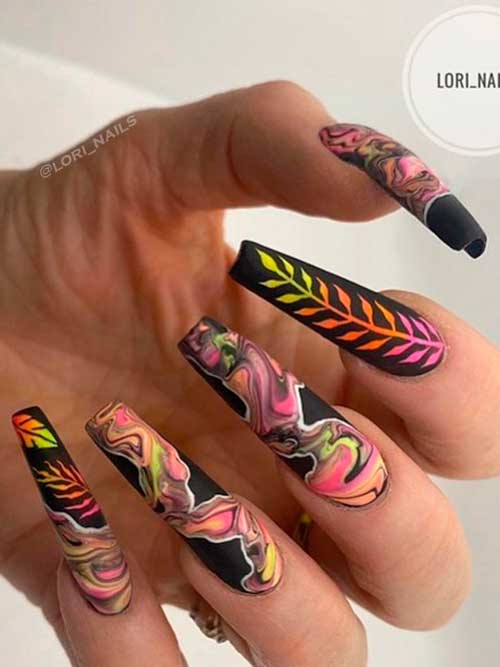 Black Nails with Neon Nail Art Long Coffin Shaped Black Nails with Neon Water Marbling and Leaf Nail Art for Summertime