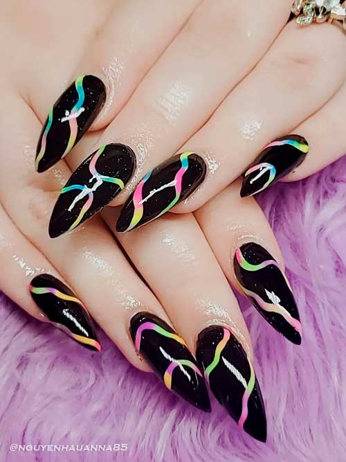 Glossy Black Stiletto Nails with Colorful Swirls