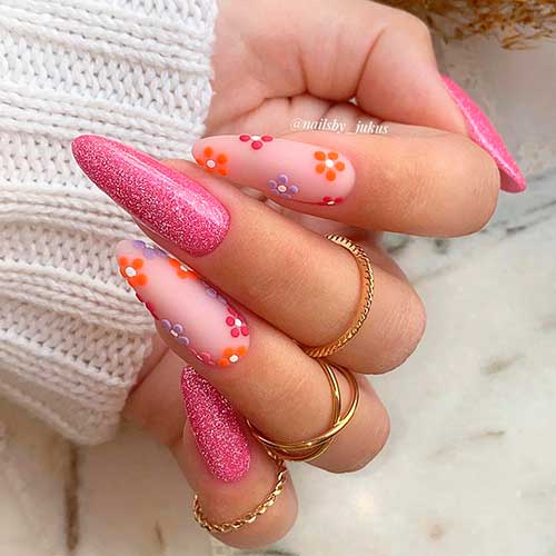 Long Almond Shaped Shimmer Pink Nails with Floral Accents